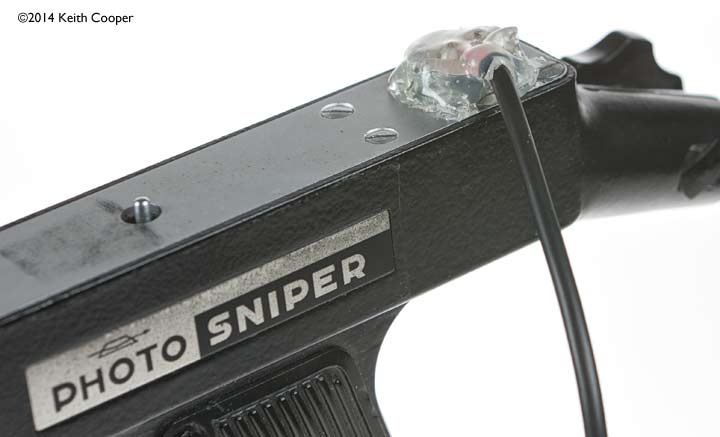 small switch mounted on photosniper rifle mount