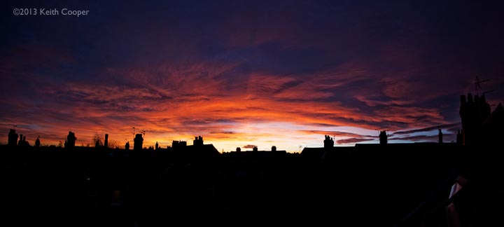 sunset photo with skyline silhouette