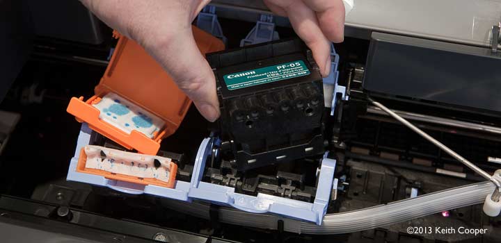 fitting ink cartridges to the iPF6400 and 6450
