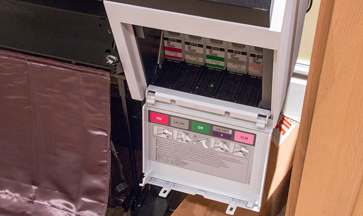 front panel for access to ink carts