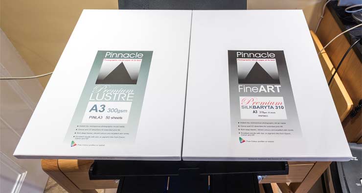two boxes of A3 photo paper