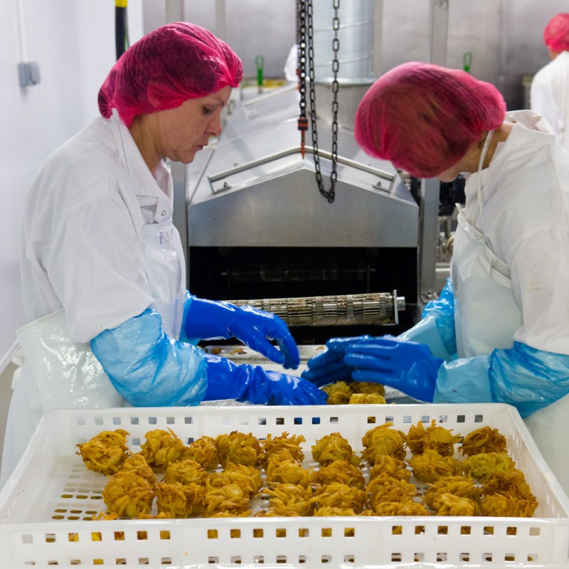 Workers packing onion bhajis