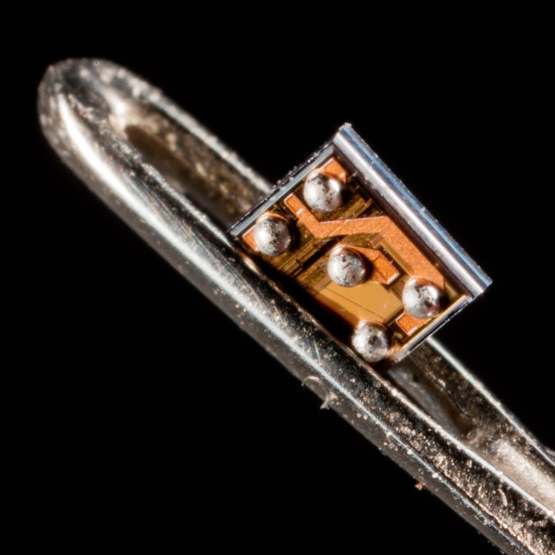 Electronic chip in eye of needle
