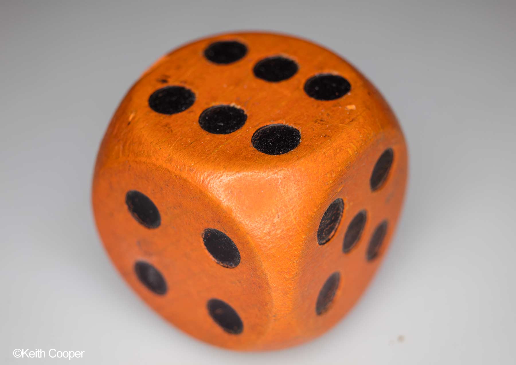 orange wooden die